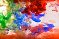 Colorful ink swirling in water Royalty Free Stock Photo