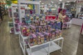 Colorful interior view of toys department of Macy`s store. Stand with Barbie dolls on front. New York. Royalty Free Stock Photo