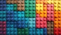 Colorful interlocking plastic blocks create a structured geometric pattern. The tactile toys are arranged in a grid showing Royalty Free Stock Photo