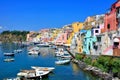 Colorful island town in Italy with pastel buildings lining the harbor of Procida