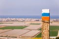 Colorful Israel Trail route sign pole barbed wire. Royalty Free Stock Photo