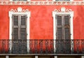 Colorful Italian balcony with doors in vintage style Royalty Free Stock Photo