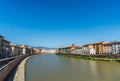 Colorful Italian houses in Pisa, Italy, alongside the embankment of Arno river. Royalty Free Stock Photo