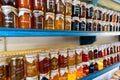 Colorful jams in glass jars.