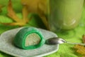 Colorful japanese sweets daifuku or mochi. Sweets close up on the plate with cup of matcha tea Royalty Free Stock Photo