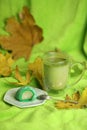 Colorful japanese sweets daifuku or mochi. Sweets close up on the plate with cup of matcha tea Royalty Free Stock Photo