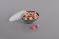 Colorful jelly bean in bowl isolated on colorful background Royalty Free Stock Photo