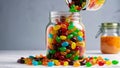 Colorful jelly beans in glass jar on isolate background. Jelly candy background Royalty Free Stock Photo