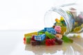 Colorful jelly candies in a bottle. Addiction concept. Royalty Free Stock Photo