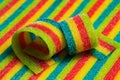 Colorful jelly candies strips in sugar sprinkles. Sour flavored rainbow candy background Royalty Free Stock Photo