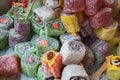Colorful jelly mix sugar roll up sweet jelly and flavor fruit at the market Royalty Free Stock Photo