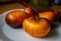 colorful, juicy, healthy tomatoes on a plate, tasty and healthy nutrition