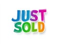 Colorful just sold graphic with vibrant brushstroke design