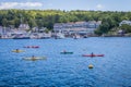 Colorful kayakers paddle in Boothbay Harbor, Maine Royalty Free Stock Photo