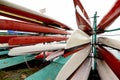 Colorful Kayaks and canoes in a Row stack Royalty Free Stock Photo