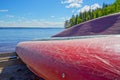 Colorful Kayaks on Lake Shore at Summer Royalty Free Stock Photo