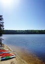 Colorful kayaks on the shore of Lake Johnson, a popular city park in Raleigh NC Royalty Free Stock Photo