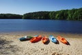 Colorful kayaks on the shore of Lake Johnson, a popular city park in Raleigh NC Royalty Free Stock Photo