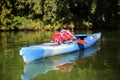 Colorful kayaks on the tropical beach.