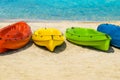 Colorful kayaks on white sand on the beach of Cyprus against of the sea backdrop Royalty Free Stock Photo