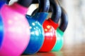 Colorful kettlebells in gym Royalty Free Stock Photo