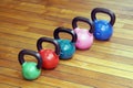 Colorful kettlebells in gym Royalty Free Stock Photo