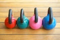Colorful kettlebells in gym Royalty Free Stock Photo
