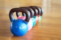 Colorful kettlebells in gym Royalty Free Stock Photo