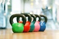 Colorful kettlebells in gym Royalty Free Stock Photo