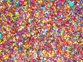 Colorful kids backdrop with small candy mosaic