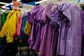 Colorful kids clothes on sale in retail store. retail store editorial photo