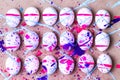 Colorful kids Easter eggs splattered in paint