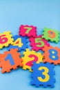 Colorful kids numbers toys on blue background