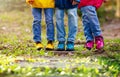 Colorful kids shoes. Children play outdoor