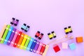 Colorful kids toys on purple background. Top view Royalty Free Stock Photo