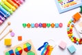 Colorful kids toys on white background. Top view, flat lay. Royalty Free Stock Photo