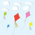 Colorful kites against the sky and clouds