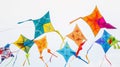 Colorful kites flying in clear sky, geometric shapes and designs Royalty Free Stock Photo