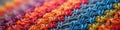 Colorful knitted textile with vibrant rainbow patterns Royalty Free Stock Photo