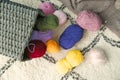 Colorful knitting yarn on floor in room Royalty Free Stock Photo