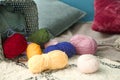Colorful knitting yarn on floor in room Royalty Free Stock Photo