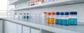 Colorful Laboratory Bottles with Liquid Solutions in Modern Space Royalty Free Stock Photo
