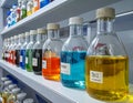 Colorful Laboratory Chemical Bottles on Shelf in Science Lab Royalty Free Stock Photo