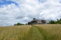 Colorful landscape with field and sky and old military fortress Royalty Free Stock Photo