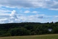 Colorful landscape with fields and meadows in Eifel mountains, Germany Royalty Free Stock Photo