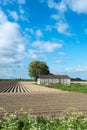 Colorful landscape with ridges from newly seeded potatoes