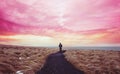 Colorful landscaped, a man walking alone on the way forward with colorful sky Royalty Free Stock Photo