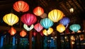 Colorful lanterns hang elegantly from the rooms ceiling Royalty Free Stock Photo