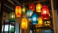 Colorful lanterns hang elegantly from the rooms ceiling Royalty Free Stock Photo