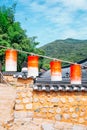 Colorful lanterns and Korean traditional stone wall at Beomeosa temple in Busan, Korea Royalty Free Stock Photo